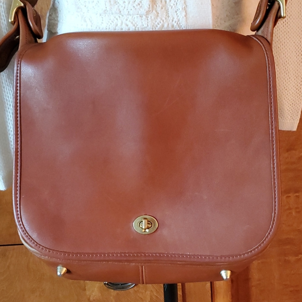 Vintage coach leather flap crossbody bag.
